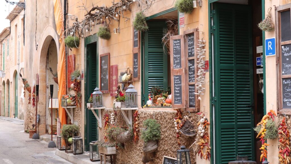 Row of shops in an alley in Spain.